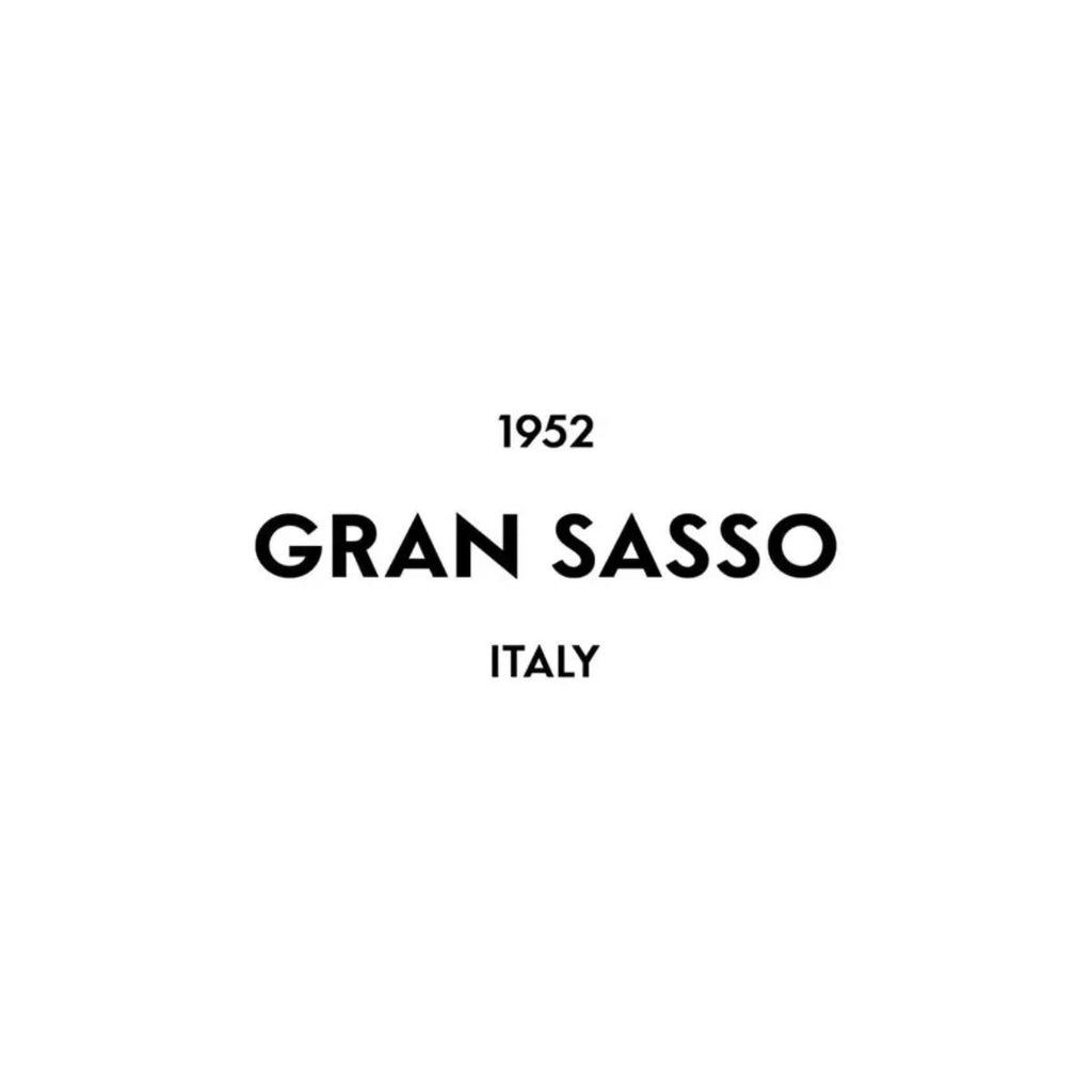 A minimalist white label or card featuring the text '1952 GRAN SASSO ITALY' in black sans-serif font, centered on a plain white background.